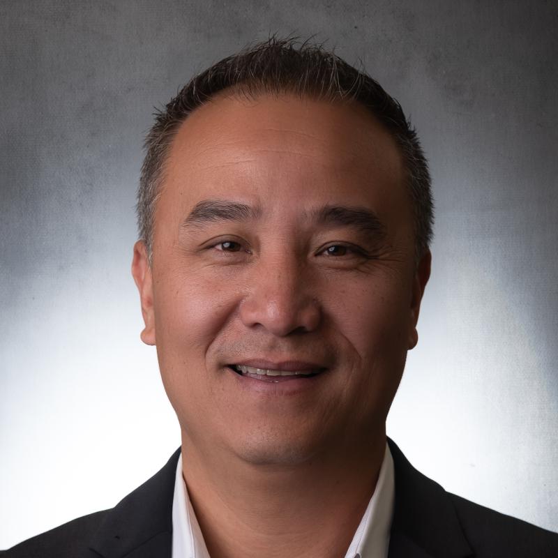 Headshot photo of Global ETS Founder, CEO, and President, Dan Tang.