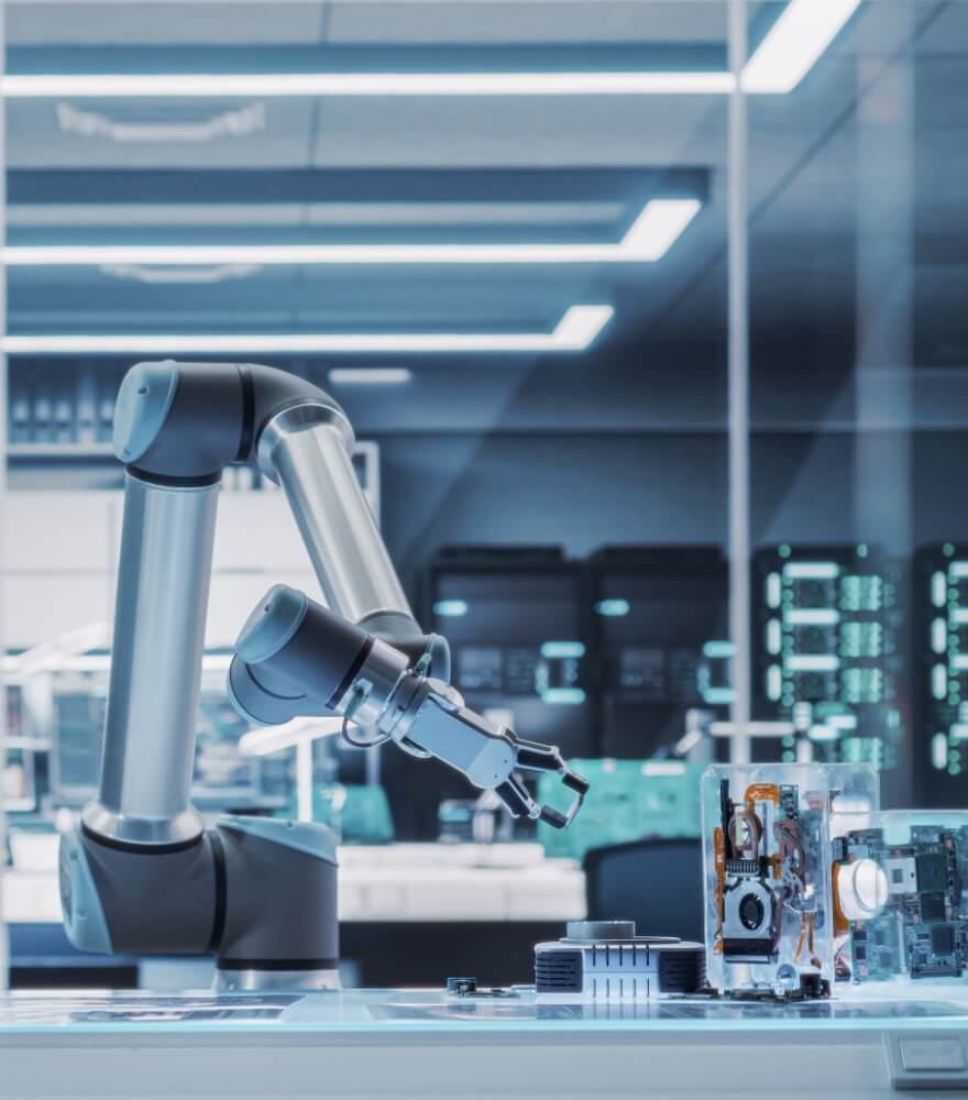 Industrial robotic arm working on a modern manufacturing assembly line in a high-tech semiconductor factory.